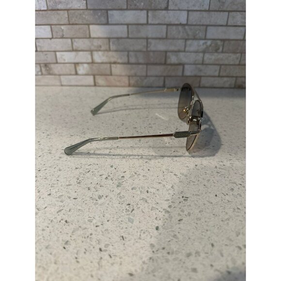 COACH WOMEN SUNGLASSES HC7140 CD474 Shiny‎ Light Gold / Grey Gradient Polarized main image 4